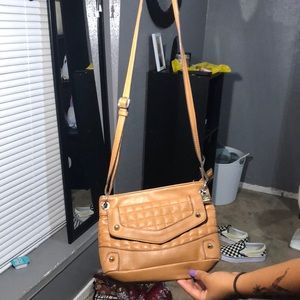 tan with gold purse